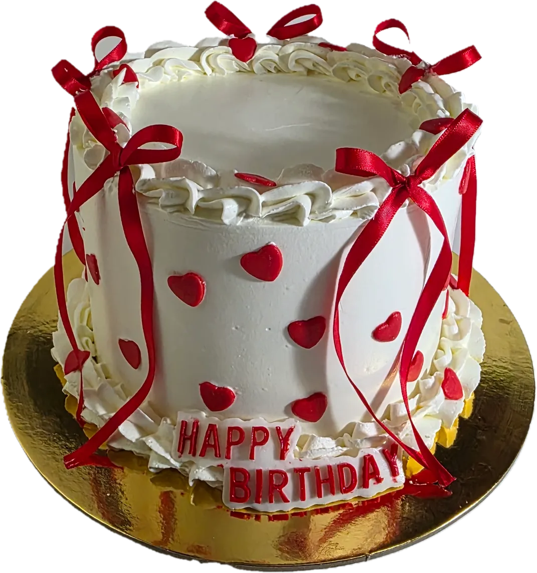 Dulce de cumpleaños blanco con detalles rojos